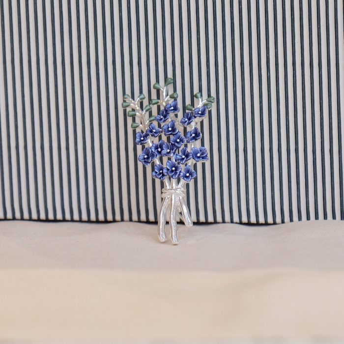 Alexander Thurlow Blue Delphinium Flower Brooch on Fabric with a Stripy background ATH963