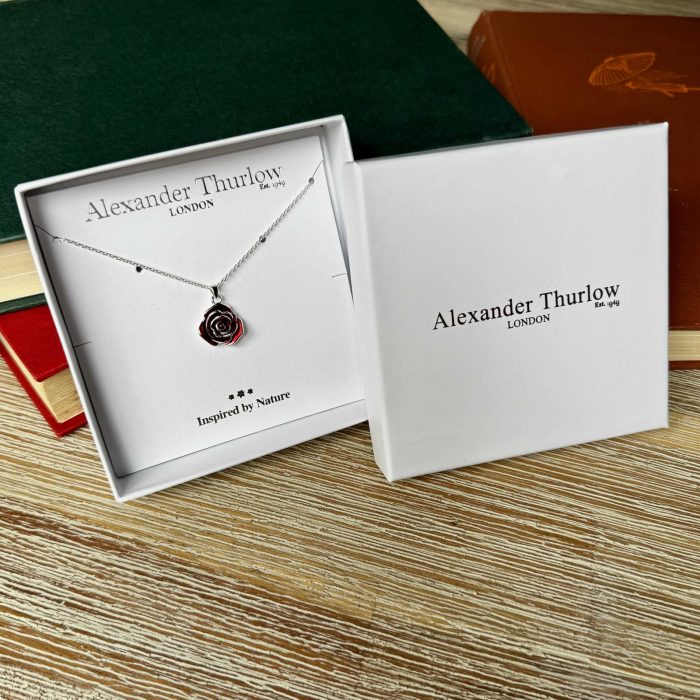 red-rose-flower-necklace-on-wood-alexander-thurlow-ath995